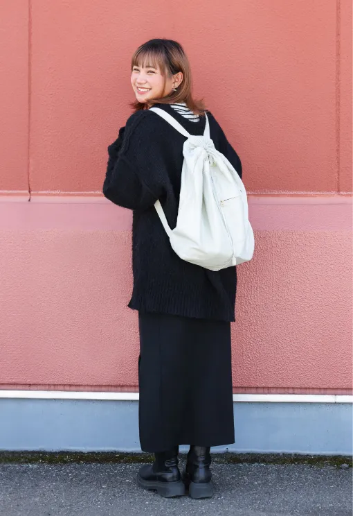 ポーターマイルのナップサックを背負う毛利さん